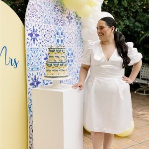 David’s Bridal short satin puff sleeve dress with empire waist